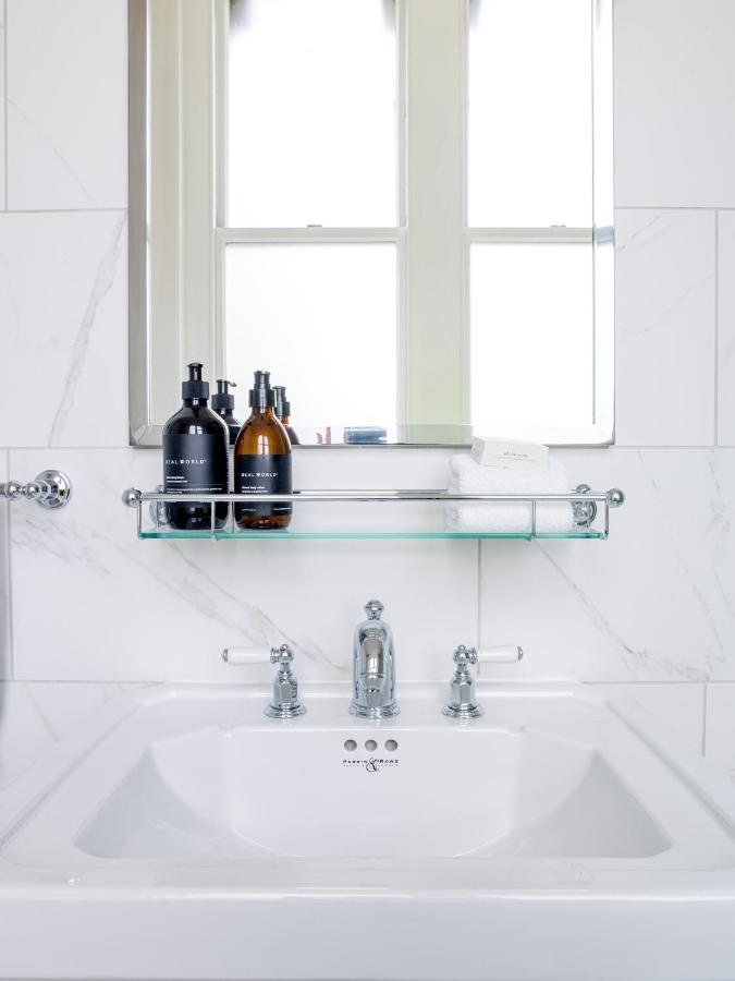 The Observatory Hotel Крайстчёрч Экстерьер фото A glass shelf